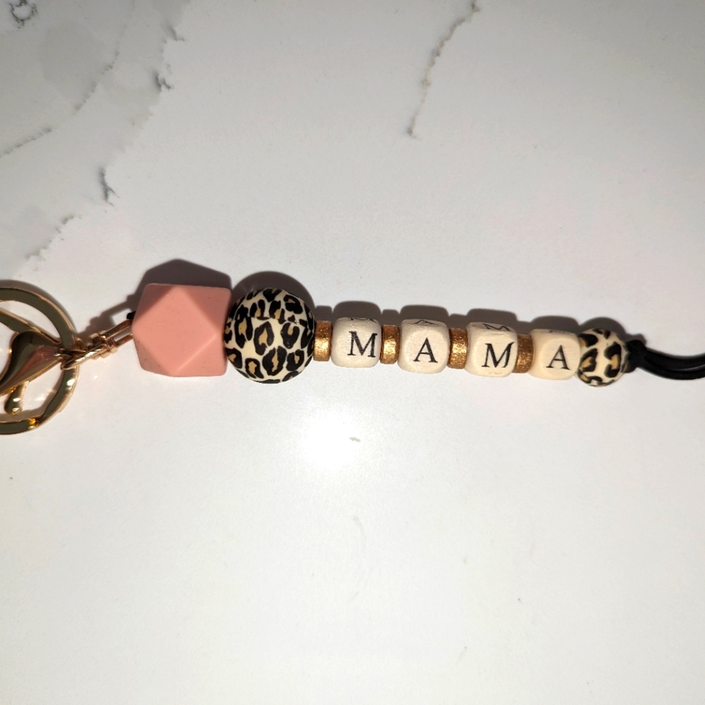 8 pack Mama and Grandma keychains. Cheetah print. Brand new.